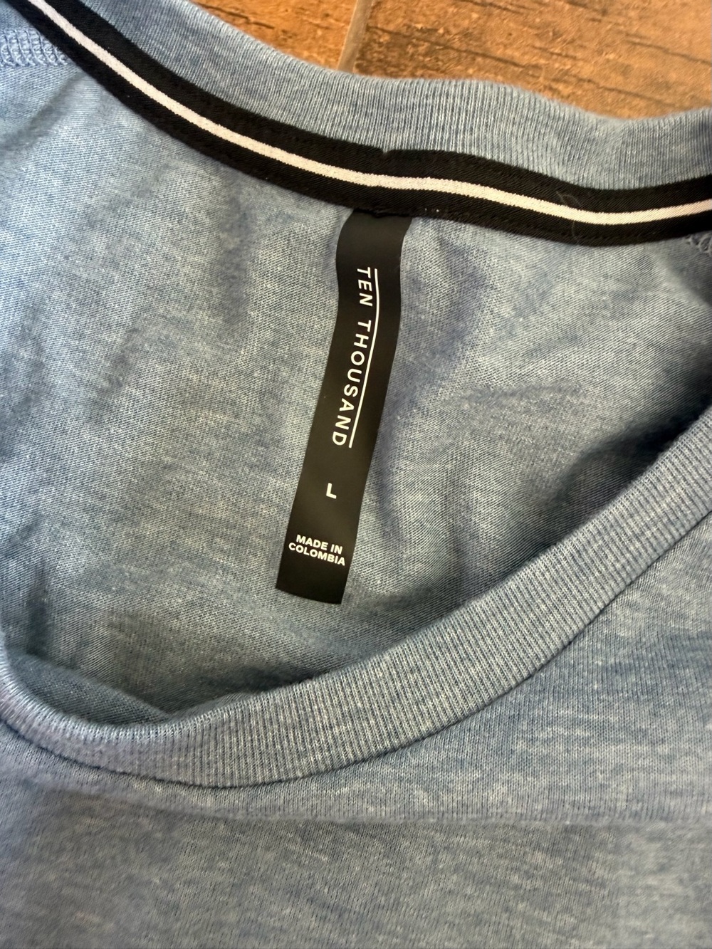 Ten Thousand t-shirt is a heathered blue athletic tee size L